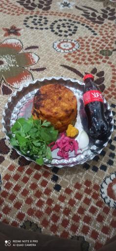 عکس 2 — طبخ غذای ترنج بانو